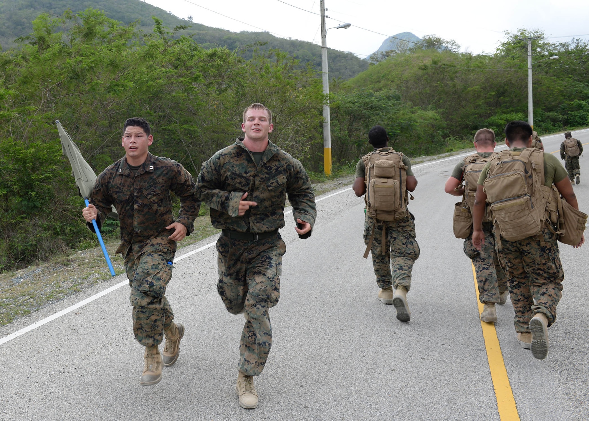 U.S. service members participate in the Sexual Assault Prevention and Response 5K Ruck March in Arroyo Cano, Dominican Republic, April 9, 2017. Statistically, most sexual assaults begin as sexual harassment and then escalate. (U.S. Air Force photo by Staff Sgt. Timothy M. Young)