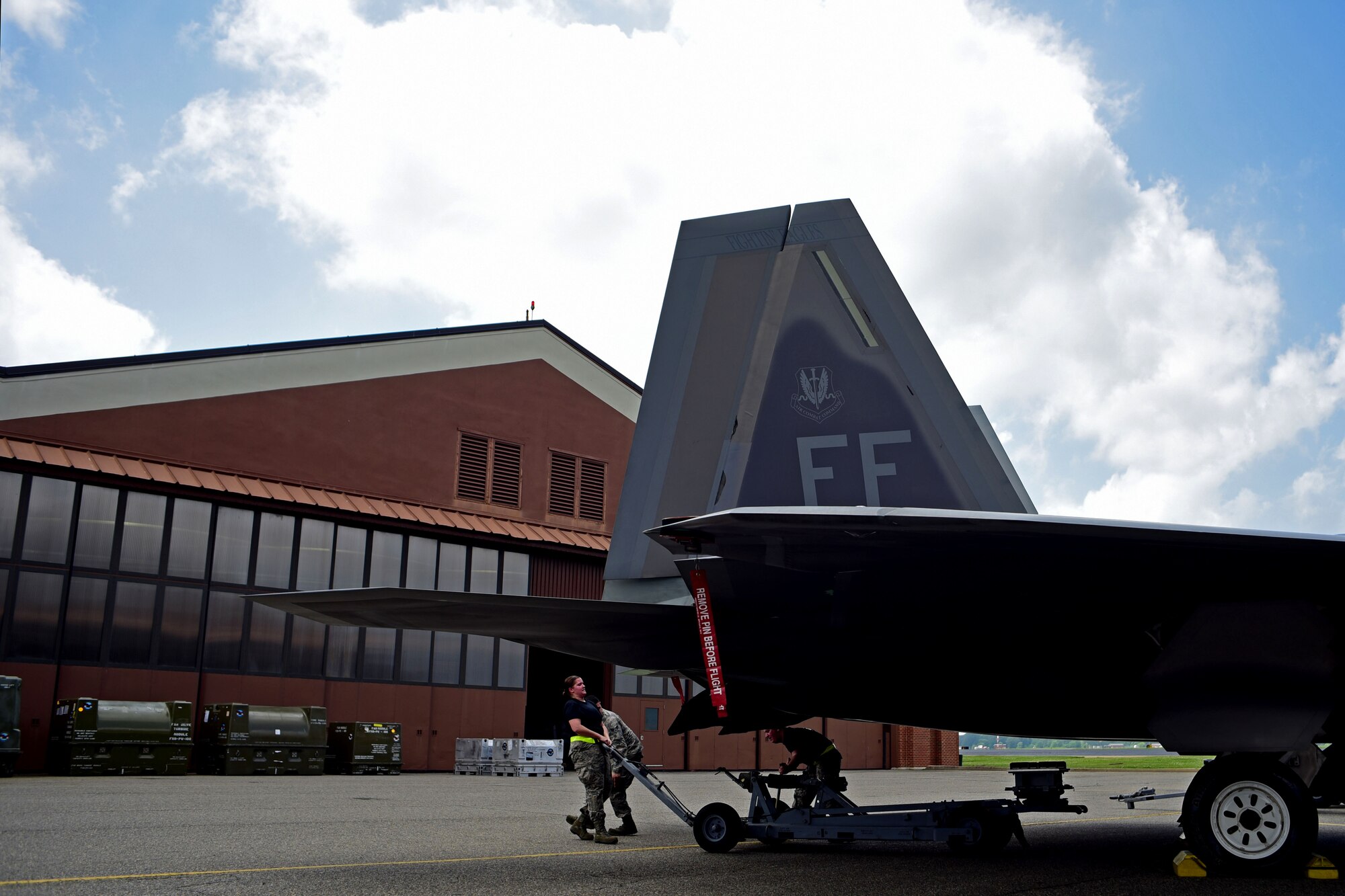 U.S. Air Force Airmen assigned to the 27th Aircraft Maintenance Unit weapons crew, finish loading munitions onto an F-22 Raptor during the 1st Maintenance Group Load Crew of the Quarter competition at Joint Base Langley-Eustis, Va., April 28, 2017. The winner of this quarter’s competition was the 27th Aircraft Maintenance Unit. 