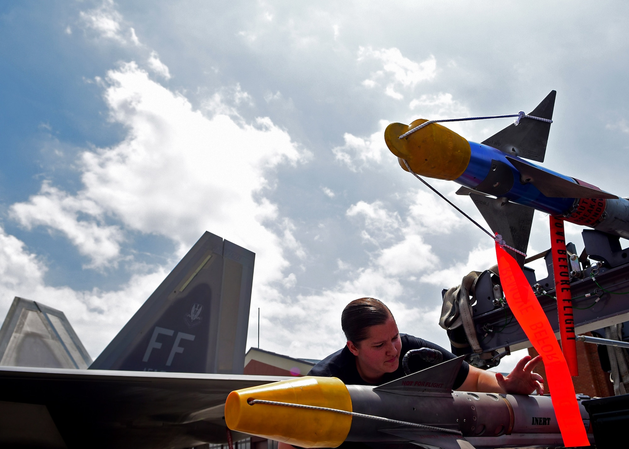 U.S. Air Force Airman 1st Class Amanda Danico, 27th Aircraft Maintenance Unit weapons crew member, inspects munitions during the 1st Maintenance Group Load Crew of the Quarter competition at Joint Base Langley-Eustis, Va., April 28, 2017. The competition, which is held each quarter, gives Airmen from each AMU the opportunity to showcase their proficiency in loading aircraft munitions. 