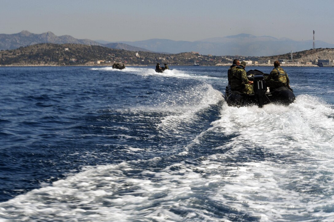U.S. and Greek service members return to shore after participating in an Exercise Stolen Cerberus IV training event near Elefsis Air Base, Greece, April 27, 2017. Air Force photo by Senior Airman Tryphena Mayhugh