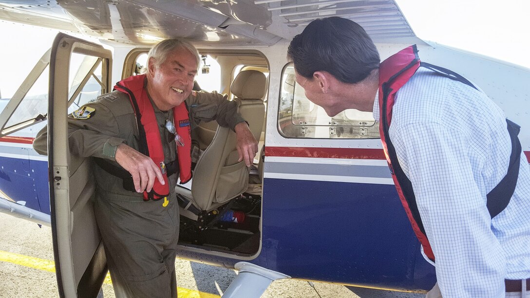 Civil Air Patrol mission pilot Capt. Richard Farmer, a member of the Florida Wing’s Marco Island Senior Squadron, briefs WPTV reporter Charlie Keegan on safety procedures for a NORAD intercept exercise over south Florida. Photo by CAP Lt. Col. Jeff Carlson