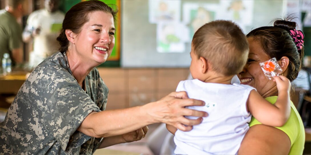 U.S. Army Lt. Col. Rhonda Dyer provides deworming and preventative medication to Hondurans at a Medical Readiness Training Exercise site at Cooperativa village, Colon, Honduras , Apr. 20, 2017. Joint Task Force – Bravo Medical Element, provided care to more than 850 patients during a Medical Readiness Training Exercise in Cooperativa village, Colon, Honduras, Apr. 20-21, 2017. MEDEL also supported a Military Partnership Engagement and assisted more than 650 patients with the Hondurian Navy in Santa Rosa de Aguan, Colon, Honduras, Apr. 22, 2017. (U.S. Air National Guard photo by Master Sgt. Scott Thompson/released) (Photo by Master Sgt. Scott Thompson)
