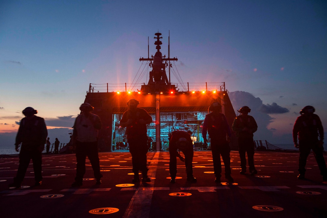 Sailors search for foreign object debris on the USS Coronado in the South China Sea, April 30, 2017. The ship is patrolling the region's littorals and working with partner navies to provide the U.S. 7th Fleet with the flexible capabilities it needs now and in the future.  Navy photo by Petty Officer 3rd Class Deven Leigh Ellis