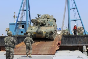 Republic of Korea military members offload equipment using the Trident pier during the Combined Joint Logistics Over-the-Shore 2017 exercise in Pohang, South Korea, April 13, 2017. The Trident pier is an 1200-ft long portable, floating platform that links offshore operations to land. (U.S. Army photo/Capt. Derrick Dixon)