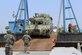 Republic of Korea military members offload equipment using the Trident pier during the Combined Joint Logistics Over-the-Shore 2017 exercise in Pohang, South Korea, April 13, 2017. The Trident pier is an 1200-ft long portable, floating platform that links offshore operations to land. (U.S. Army photo/Capt. Derrick Dixon)