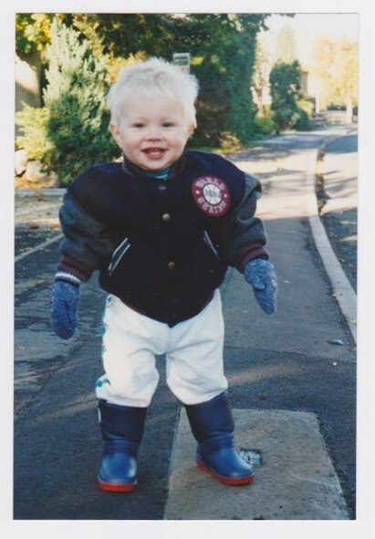 A young Michael Drinkwater, now a U.S. Air Force Senior Airman assigned to the 354th Contracting Squadron as a contract specialist, poses for a photo in England, where he was born. Drinkwater has since become a U.S. citizen and is stationed at Eielson Air Force Base, Alaska. (Courtesy Photo)