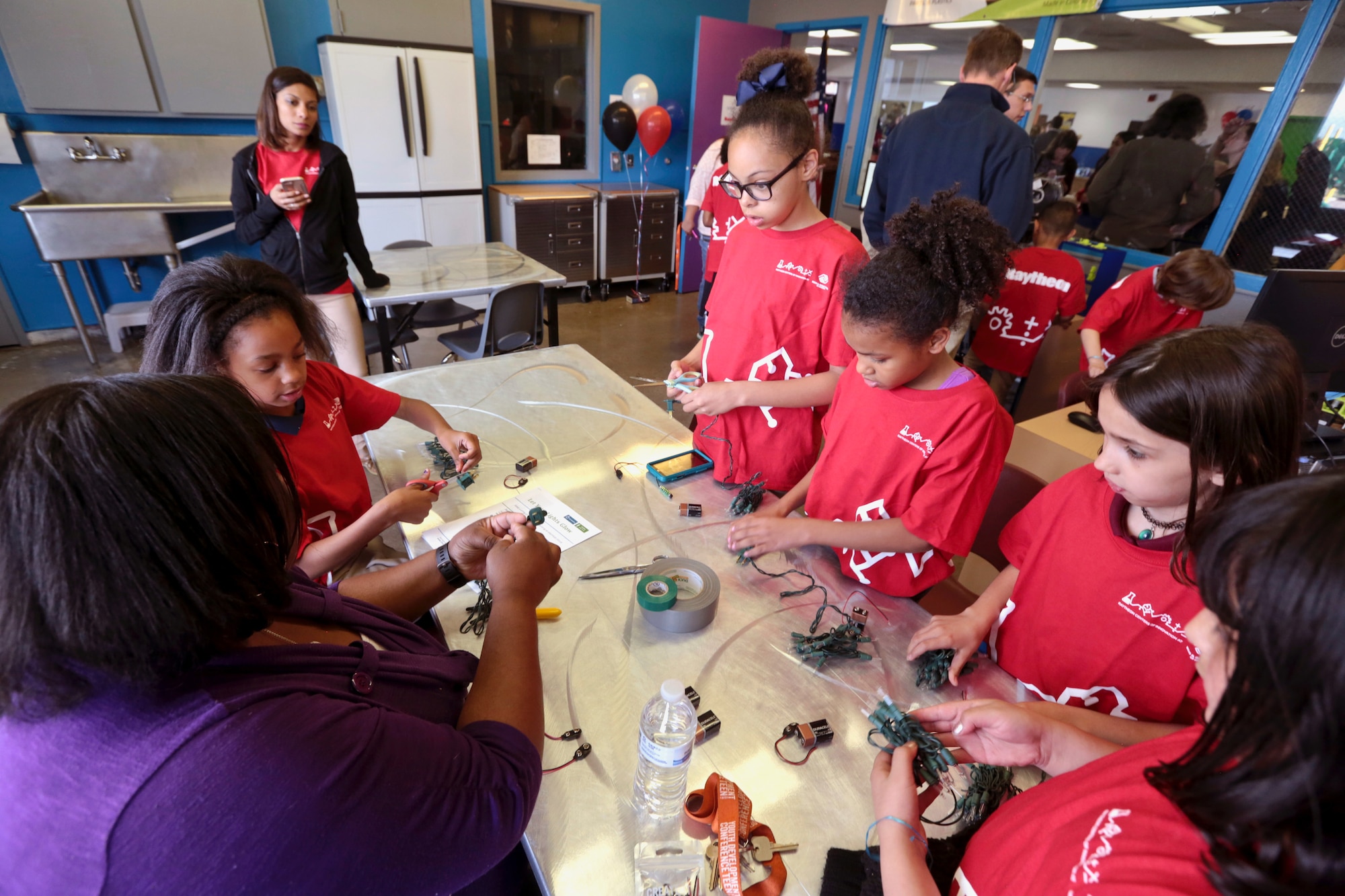COLORADO SPRINGS, Colo. --- Children work on an electrical experiment while attending the opening of Raytheon's Stem Center of Innovation at the Boys and Girls Club of the Pikes Peak Region in Colorado Springs, CO Thursday, April 27, 2017. (Courtesy AP Images for Boys & Girls Club of America)