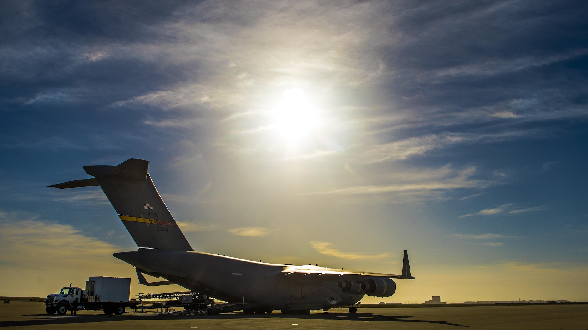 Members from the 26th Aerial Port Squadron load a communications vehicle from the U.S. Coast Guard's Mobile Contingency Communications Detachment West, onto an awaiting C-17 Globemaster III from March Air Reserve Base, California on April 27, 2017 at Vandenberg Air Force Base, California. Patriot Hook is an annual joint-service exercise coordinated by the Air Force Reserve, designed to integrate the military and first responders of federal, state and local agencies by providing training to mobilize quickly and deploying in military aircraft in the event of a regional emergency or natural disaster. (U.S. Air Force photo by Benjamin Faske)