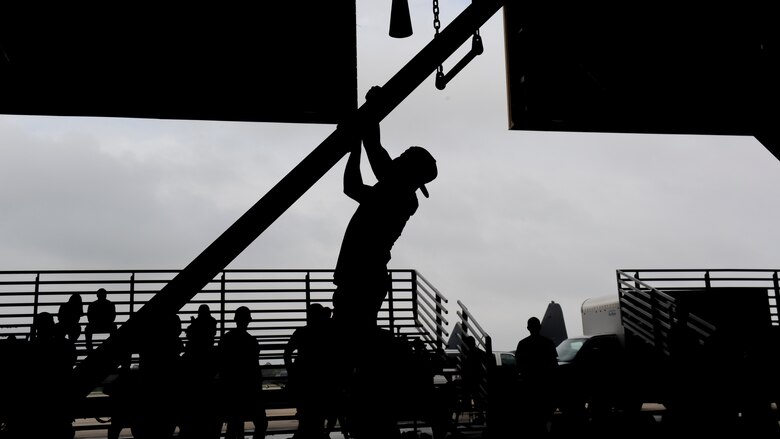 Bo Flume, a participant in the Alpha Warrior battle rig competition ascends the devil's staircase at Hurlburt Field, Fla., April 29, 2017. Flume was one of many to participate in the event which challenged grip-strength, agility and core strength. (U.S. Air Force photo by Airman 1st Class Dennis Spain)