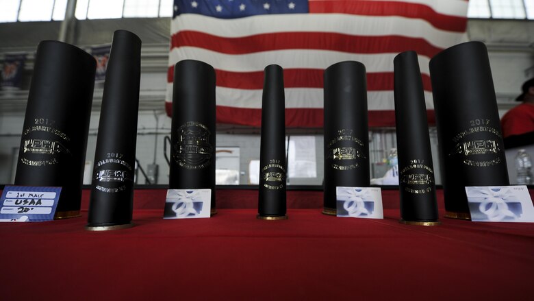 Air Commandos and families participated in the Alpha Warrior battle rig competition at the Commando Hangar on Hurlburt Field, Fla., April 29, 2017. Alpha Warrior is an obstacle competition similiar to that of the television competition show American Ninja Warrior. Awards were given to top performers in each category. (U.S Air Force photo by Airman 1st Class Dennis Spain)