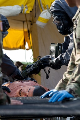 A Soldier from the 51st Chemical Company 83rd Battalion stationed in Fort Stewart, Ga., makes a last check for contamination on a scenario victim before medics can begin a medical assessment April 29, 2017, as part of Guardian Response at Muscatatuck Urban Training Center, Ind. Exercise Guardian Response is a multi-component training exercise run by the U.S. Army Reserve designed to validate more than 4,000 service members in Defense Support of Civil Authorities (DSCA) in the event of a Chemical, Biological, Radiological and Nuclear (CBRN) catastrophe. This year's exercise simulated an improvised nuclear device explosion with a source region electromagnetic pulse (SREMP) out to more than four miles. The 84th Training Command is the hosting organization for this exercise, with the training operations run by the 78th Training Division, headquartered in Joint Base McGuire-Dix-Lakehurst, New Jersey. (U.S. Army Reserve Photo by Maj. Adam Weece, 206th Broadcast Operations Detachment)