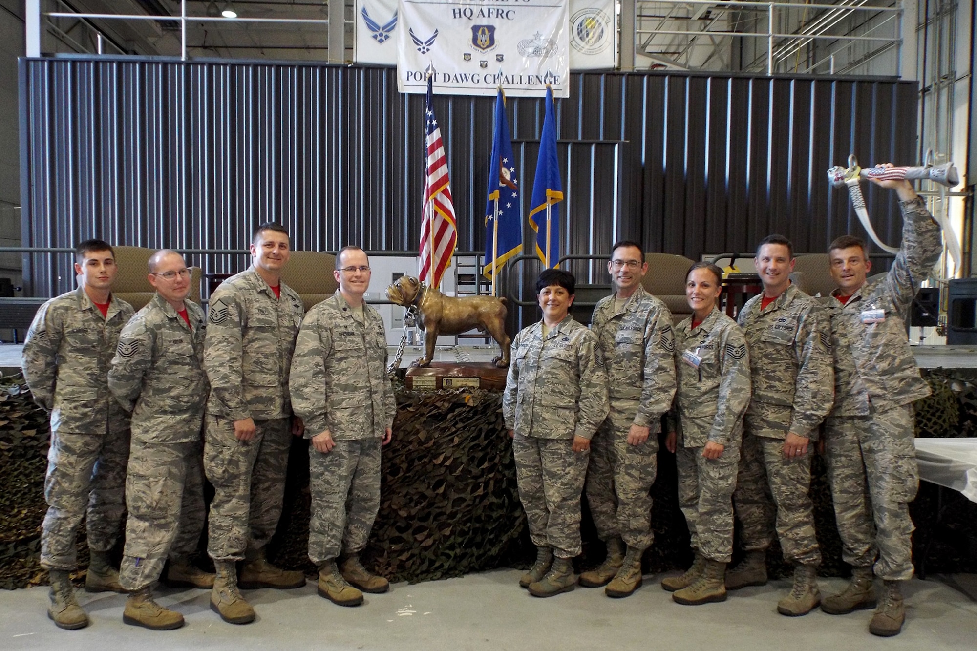U.S. Air Force Reserve members from the 96th Aerial Port Squadron, 913th Airlift Group, pose for photos after winning the “Top Dawg” trophy during the Air Force Reserve Command Port Dawg Challenge awards ceremony April 27, 2017, at Dobbins Air Reserve Base, Ga. The 96th APS is the first repeat winner since the competition began in 2010, and will return the “Top Dawg” trophy to Little Rock Air Force Base. (U.S. Air Force photo by Tech. Sgt. Debra Gentry/Released)