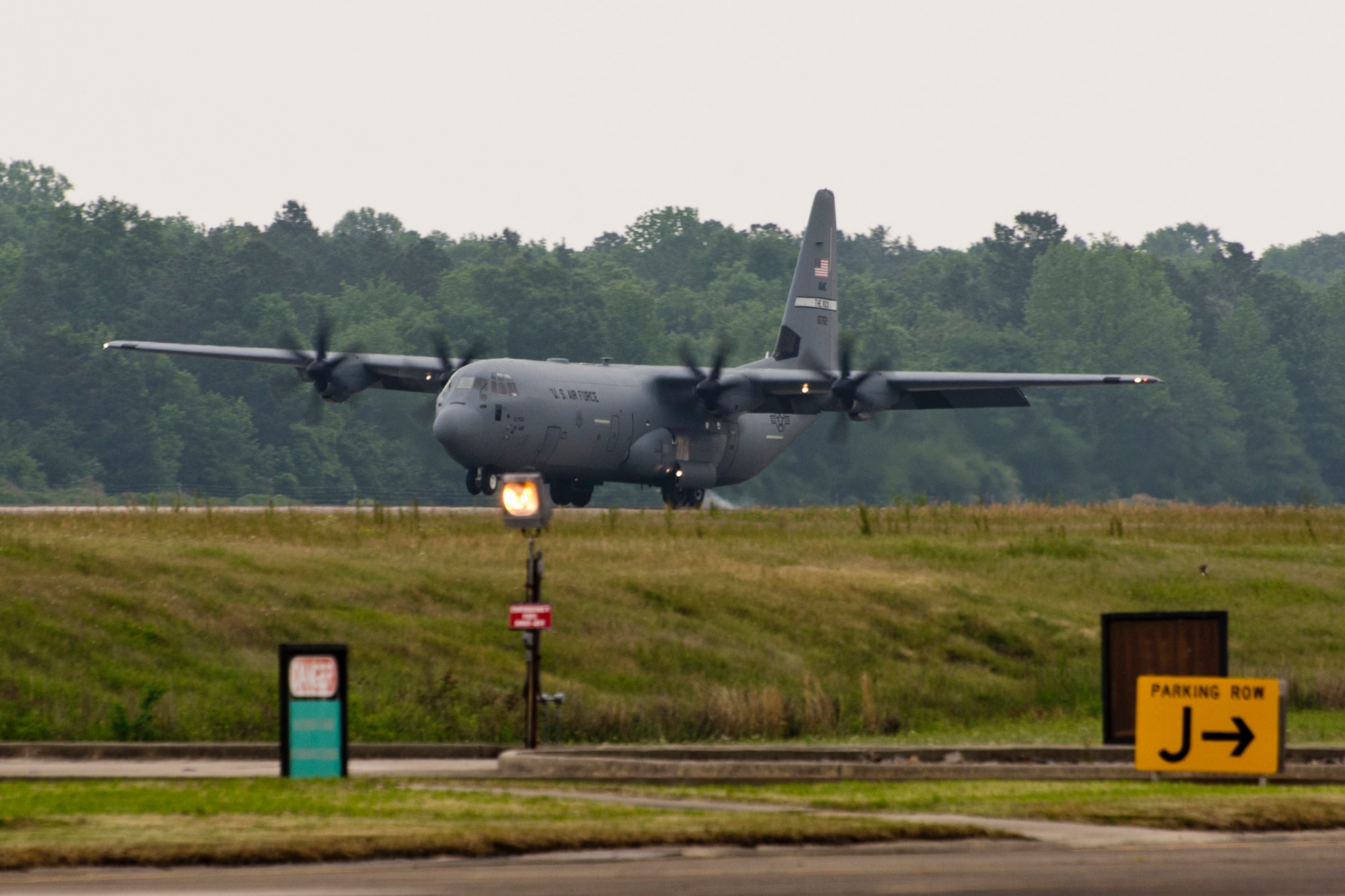 A C-130J Super Hercules carrying winners of the 2017 Air Force Reserve Command Port Dawg Challenge touches down at Little Rock Air Force Base, Ark., April 28, 2017. The competition took place from April 25-27, at Dobbins Air Reserve Base, Ga., pitting 23 teams against each other in 12 different events designed to foster communication, leadership, professionalism and camaraderie between the participants. (U.S. Air Force photo by Master Sgt. Jeff Walston/Released)