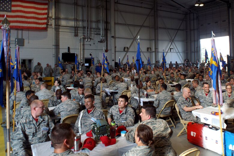 U.S. Air Force Reserve Airmen gather for the Air Force Reserve Command Port Dawg Challenge awards ceremony April 27, 2017, at Dobbins Air Reserve Base, Ga. Over a three day period, 23 aerial port teams competed in 12 events to be recognized as the best in the air transportation field. (U.S. Air Force photo by Tech. Sgt. Debra Gentry/Released)