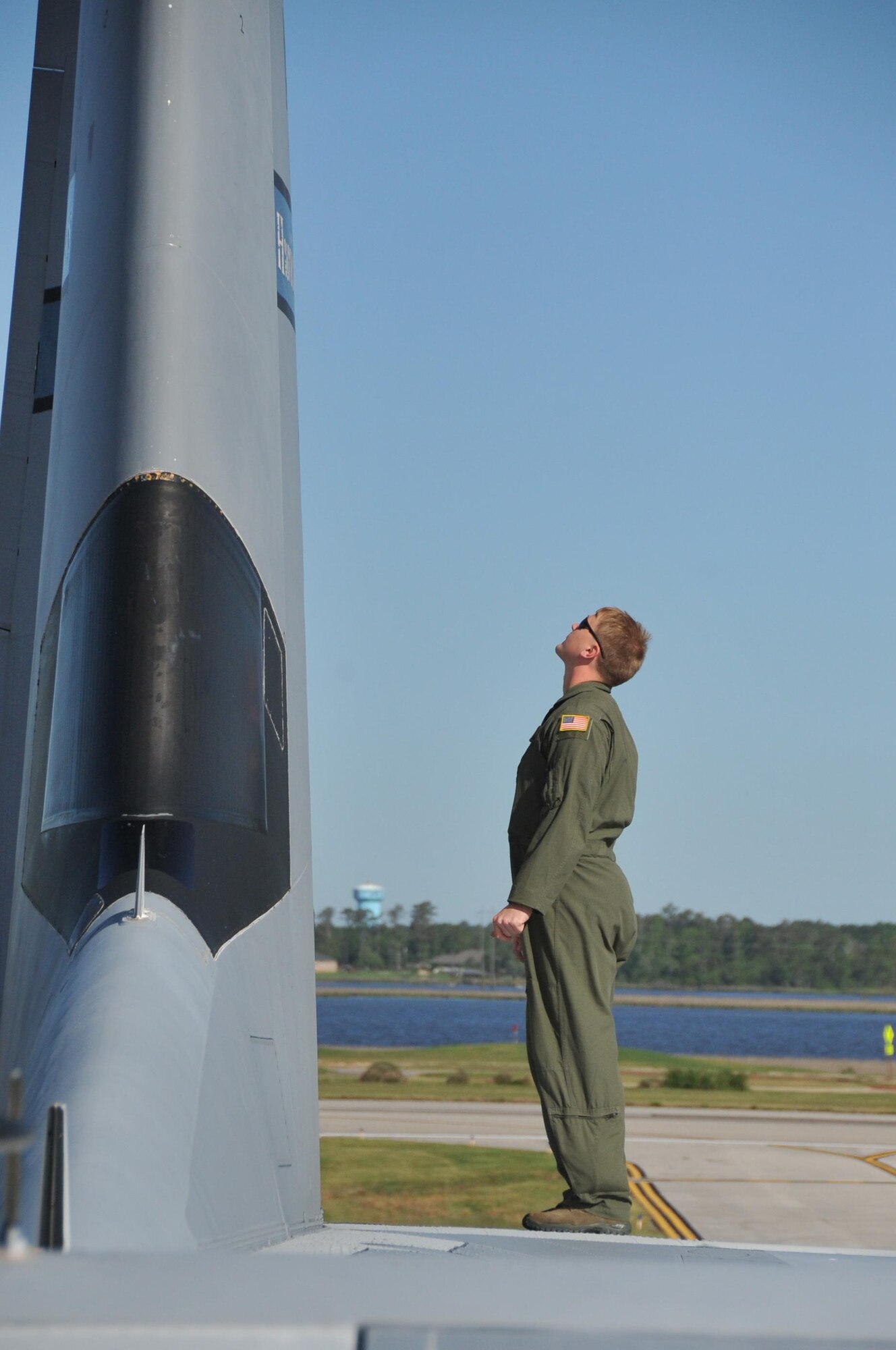 Staff Sgt. Jesse Jordan, 53rd Weather Reconnaissance Squadron loadmaster, conducts an inspection of the WC-130J Super Hercules aircraft. Jordan is responsible for making sure that the equipment and personnel are loaded accurately to ensure the safety of the aircraft and the crew.  (U.S. Air Force photo//Master Sgt. Jessica Kendziorek)