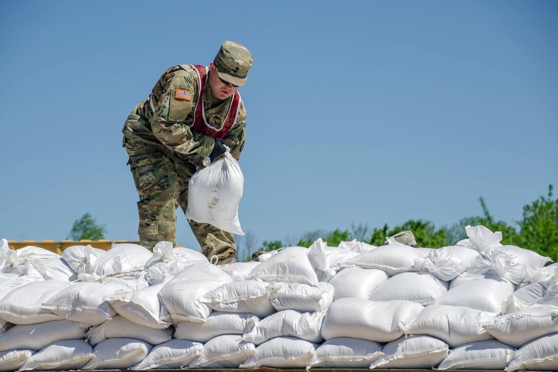 A Missouri National Guardsman fills sandbags in Poplar Bluff, Mo., May 2, 2017. Air National Guard photo by Staff Sgt. Colton Elliott