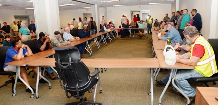 Colleagues as well as family members attend an awards ceremony for Brian Cox, work leader, Heating, Ventilation and Air Conditioning, Public Works Branch, Marine Corps Logistics Base Albany, here, recently. Cox received the Marine Corps Installations EAST, 2016 Civilian of the Year commendation. Col. James C. Carroll III, commanding officer, MCLB Albany, presented the citation on behalf of Brig. Gen. Thomas Weidley, commanding general, MCIEAST, Camp Lejeune, N.C.