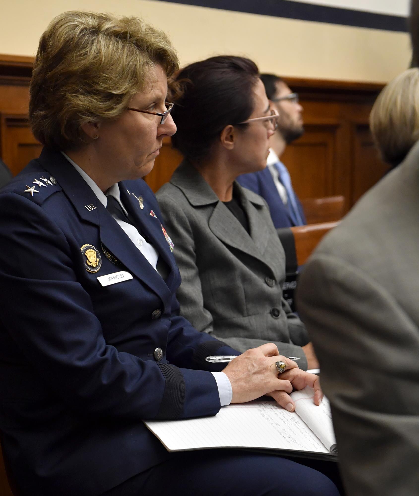 Lt. Gen. Michelle Johnson, the U.S. Air Force Academy superintendent, listens to the testimony of four service members who have been sexually assaulted before testifying before the House Armed Services Committee on sexual assault within America's service academies May 2, 2017, in Washington, D.C.  Johnson was joined by Vice Adm. Walter E. "Ted" Carter, Jr., the U.S. Naval Academy superintendent, Lt. Gen. Robert L. Caslen, Jr., the U.S. Military Academy superintendent and Dr. Elizabeth Van Winkle, the assistant secretary of defense for readiness. (U.S. Air Force photo/Wayne A. Clark)