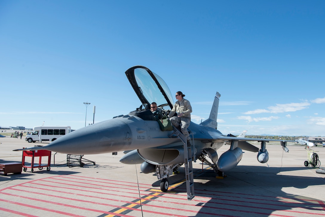 Col. Floyd W. Dunstan, commander, 140th Wing, Colorado Air National Guard, prepares to fly the F-16 Fighting Falcon aircraft on the first leg of the journey to Kadena Air Base, Japan for the Theater Security Package deployment of the 140th Wing, Colorado Air National Guard.