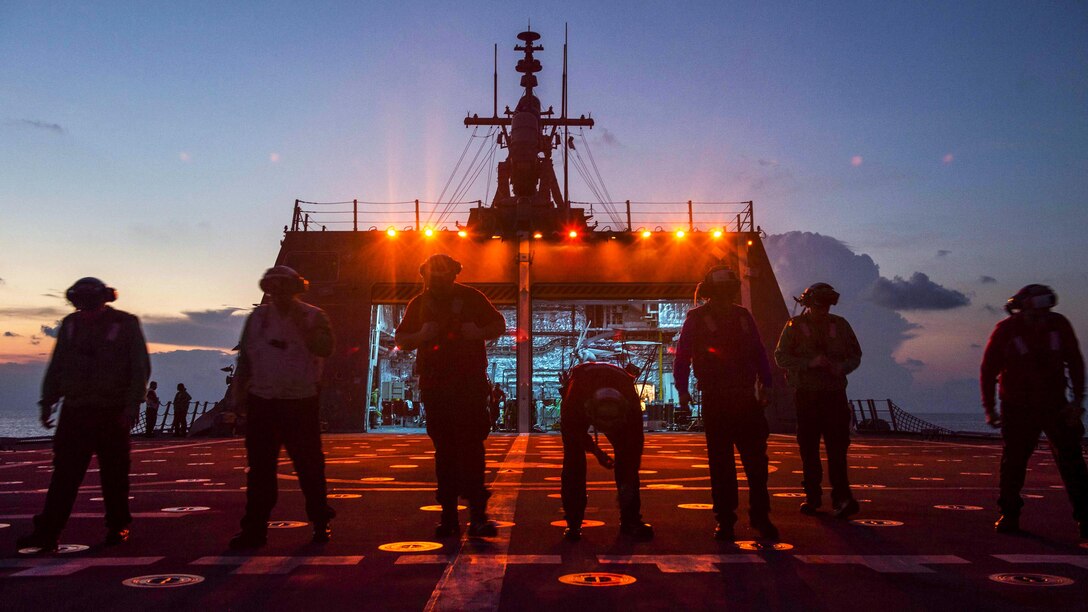 Sailors search for foreign object debris on the USS Coronado in the South China Sea, April 30, 2017. The ship is patrolling the region's littorals and working with partner navies to provide the U.S. 7th Fleet with the flexible capabilities it needs now and in the future. Navy photo by Petty Officer 3rd Class Deven Leigh Ellis
