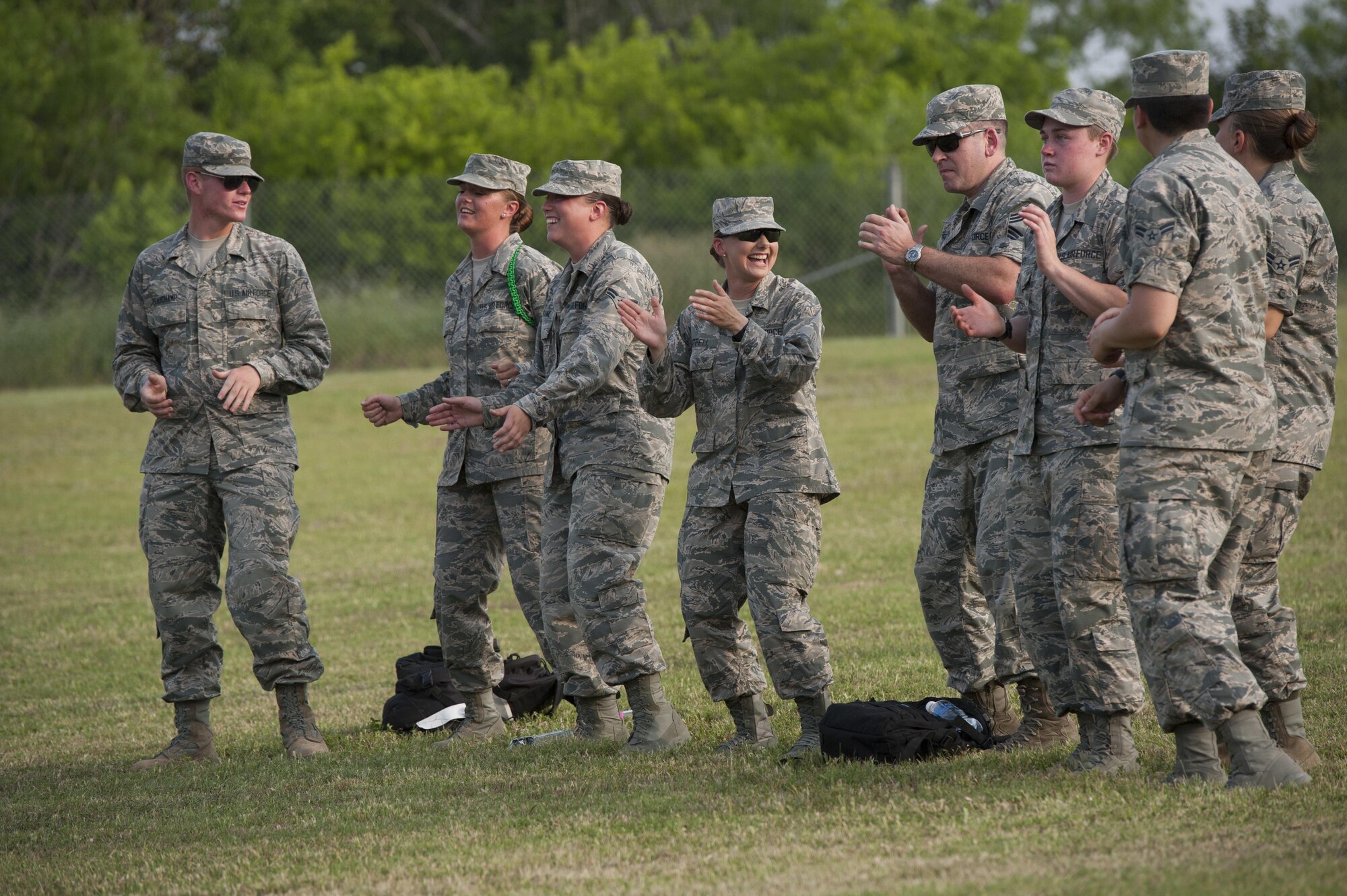 Chief Master Sgt. Jebodiah Eaton, Chief of Production, enjoys music with Air Force Security Forces students during the Max Impact performance. The United States Air Force Band’s premier rock band, Max Impact and their debut of a song and video written especially for the 37th Training Wing Basic Military Training Cadre and support staffs. This was written as a recognition and thank you for their service and mission to, “Transform civilians into motivated, disciplined warrior Airmen with the foundation to serve in the world’s greatest Air Force.” The debut took place at Joint Base San Antonio – Lackland, Saturday April 29, 2017. (U.S. Air Force photo by Staff Sgt. Daniel Owen)