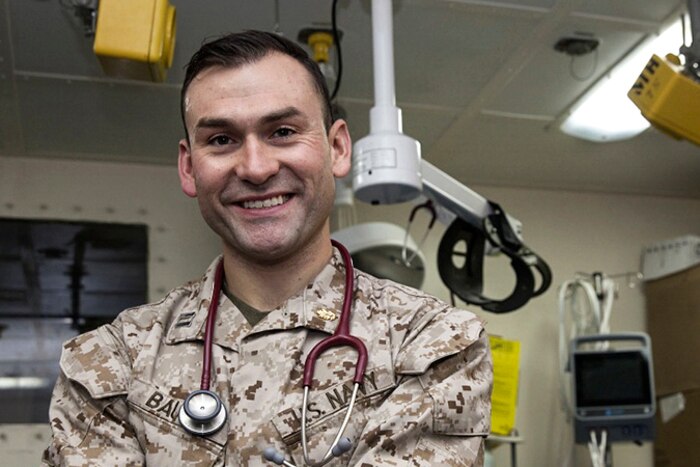 Navy Lt. Joshua Bautz, pictured here at sea in an April 16, 2017 photo, decided to run the Boston Marathon in spirit due to his recent deployment. He is one of the medical officers assigned to Combat Logistics Battalion 24, deployed with the 24th Marine Expeditionary Force, as part of the shock trauma platoon. Marine Corps photo by Gunnery Sgt. Adaecus Brooks