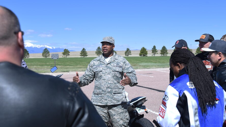 Staff Sgt. Morris Thomas, 50th Space Wing Safety office occupational safety manager, speaks with Schriever motorcyclists before they embark on their motorcycle mentorship ride during safety office’s traffic safety week at Schriever Air Force Base, Colorado, Friday, April 28, 2017.  Participants were a diverse mix of inexperienced and veteran motorcycle riders, each sharing lessons learned. (U.S. Air Force photo/Airman 1st Class William Tracy)