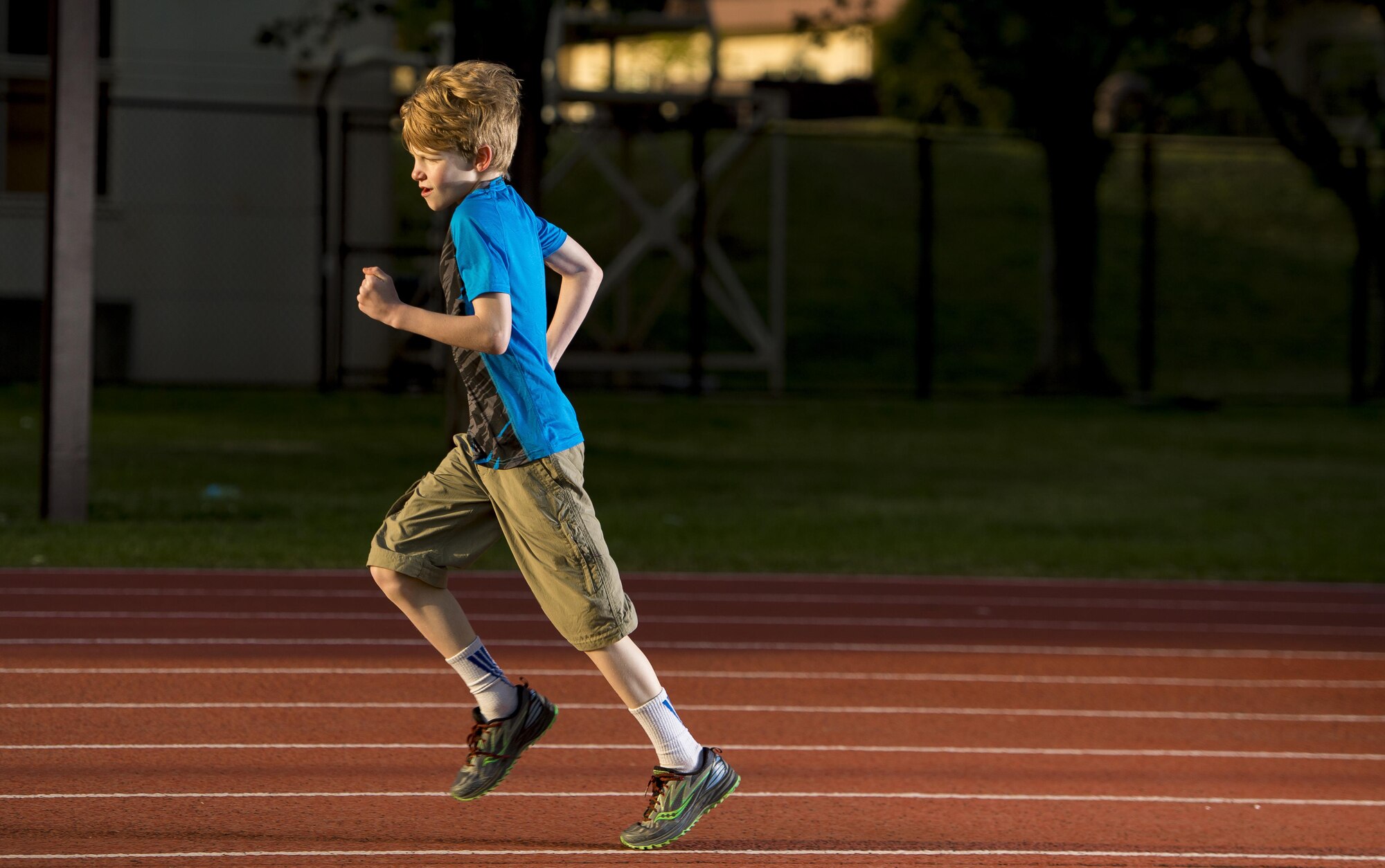 A young Warrior Run fitness program participant runs April 28, 2017, at Yokota Air Base, Japan. The Warrior Run was started to specifically target and improve Air Force PT test scores, but has now adopted a broader focus of building a strong base community by developing healthy habits. (U.S. Air Force photo by Airman 1st Class Donald Hudson)