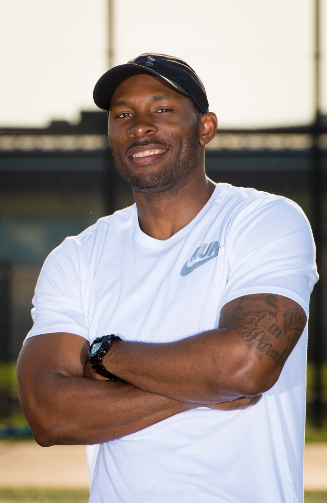 Warrior Run fitness program organizer and coach Brandon Waller, 374th Aerospace Medicine Squadron Health Promotion Flight director, poses for photo May 1, 2017, at Yokota Air Base, Japan. Each Warrior Run exercise has a hand full of coaches who are there to motivate and help people who may be having trouble with how they perform their exercises. (U.S. Air Force photo by Airman 1st Class Donald Hudson)