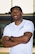 Warrior Run fitness program organizer and coach Brandon Waller, 374th Aerospace Medicine Squadron Health Promotion Flight director, poses for photo May 1, 2017, at Yokota Air Base, Japan. Each Warrior Run exercise has a hand full of coaches who are there to motivate and help people who may be having trouble with how they perform their exercises. (U.S. Air Force photo by Airman 1st Class Donald Hudson)