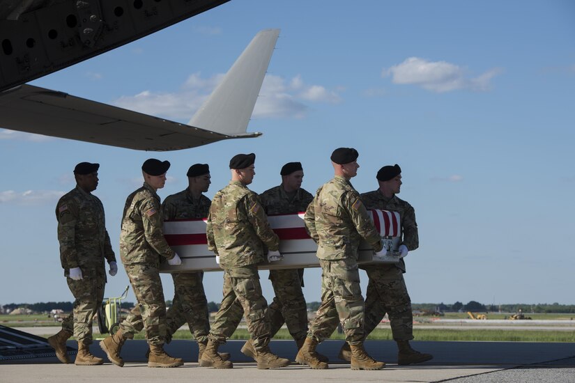 A U.S. Army carry team transfers the remains of Army 1st Lt. Weston Lee of Bluffton, Ga., May 3, 2017, at Dover Air Force Base, Del. Lee was assigned to the 1st Battalion, 325th Infantry Regiment, 2nd Brigade Combat Team, 82nd Airborne Division, Fort Bragg, N.C. (U.S. Air Force photo by Senior Airman Aaron J. Jenne)