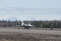 EIELSON AIR FORCE BASE, Alaska – The U.S. Air Force 354th Fighter Wing flagship F-16 Fighting Falcon aircraft assigned to the 18th Aggressor Squadron, takes off during NORTHERN EDGE 2017 (NE17), May 1, 2017, at Eielson Air Force Base, Alaska. NE17 is Alaska’s premier joint training exercise designed to practice operations, techniques and procedures as well as enhance interoperability among the services. Thousands of participants from all the services, Airmen, Soldiers, Sailors, Marines and Coast Guardsmen from active duty, Reserve and National Guard units are involved. (U.S. Air Force photo/Staff Sgt. Ashley Nicole Taylor)