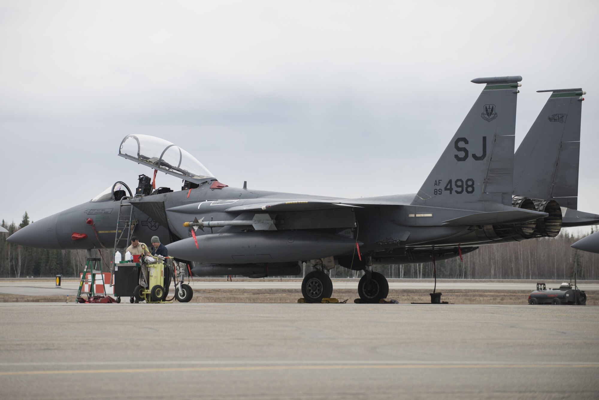 EIELSON AIR FORCE BASE, Alaska – U.S. Air Force Airmen assigned to the 335th Aircraft Maintenance Unit prepare to perform pre-flight checks on an F-15E Strike Eagle dual-role fighter aircraft assigned to the 335th Fighter Squadron, Seymour Johnson Air Force Base, N.C., prior to a sortie, May 3, 2017, at Eielson Air Force Base, Alaska, during NORTHERN EDGE 2017 (NE17). NE17 is Alaska’s premier joint training exercise designed to practice operations, techniques and procedures as well as enhance interoperability among the services. Thousands of participants from all the services, Airmen, Soldiers, Sailors, Marines and Coast Guardsmen from active duty, Reserve and National Guard units are involved. (U.S. Air Force photo/Staff Sgt. Ashley Nicole Taylor)