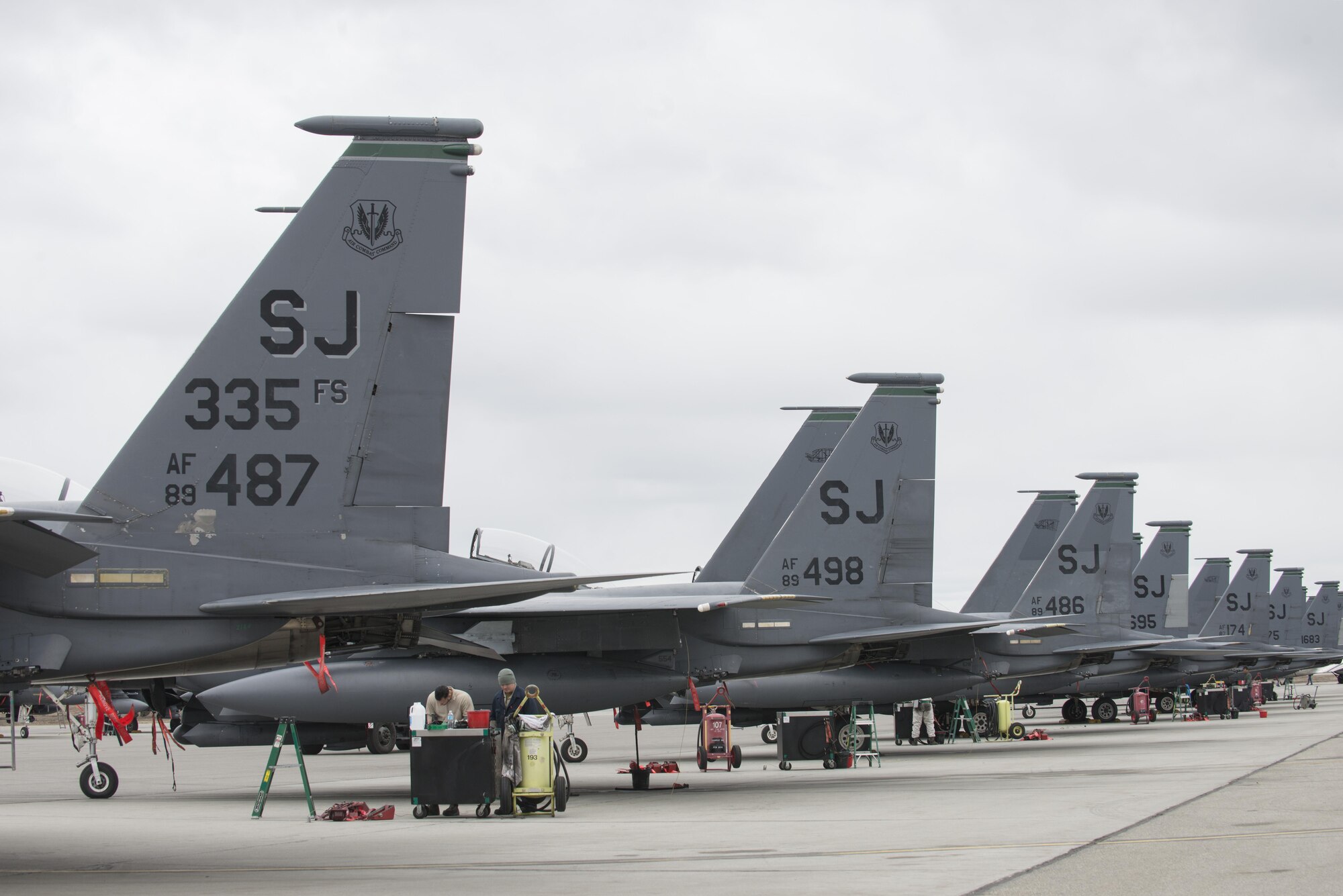 EIELSON AIR FORCE BASE, Alaska – U.S. Air Force F-15E Strike Eagle dual-role fighter aircraft assigned to the 335th Fighter Squadron, Seymour Johnson Air Force Base, N.C., are lined up on the Eielson Air Force Base, Alaska flight line, May 3, 2017 during NORTHERN EDGE 2017 (NE17). NE17 is Alaska’s premier joint training exercise designed to practice operations, techniques and procedures as well as enhance interoperability among the services. Thousands of participants from all the services, Airmen, Soldiers, Sailors, Marines and Coast Guardsmen from active duty, Reserve and National Guard units are involved. (U.S. Air Force photo/Staff Sgt. Ashley Nicole Taylor)