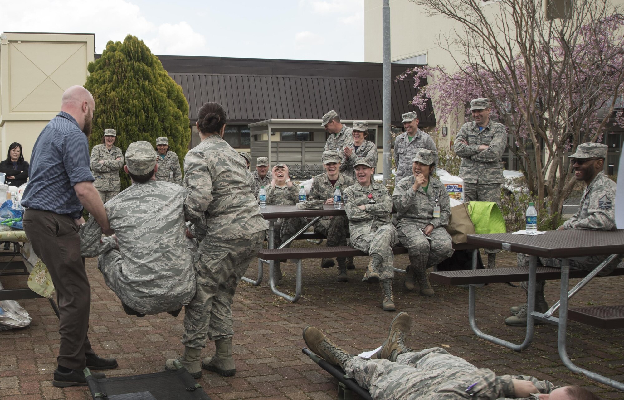 Members of the 35th Medical Group laugh during the performance of a comical skit about the importance of patient safety at Misawa Air Base, Japan, April 28, 2017. This year’s theme, United for Patient Safety, highlighted the national education and awareness-building campaign which caters to improving patient safety in the United States military and civilian hospitals. (U.S. Air Force photo by Staff Sgt. Melanie A. Hutto)