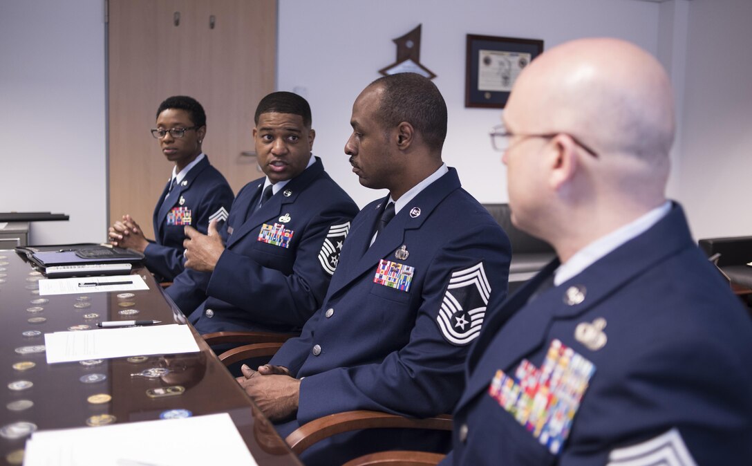 Chief Master Sergeant Phillip L. Easton, U.S. Air Forces in Europe and Air Forces Africa command chief master sergeant, (second from left) provides the rules of engagement to board members as he presides over the USAFE-AFAFRICA 12 Outstanding Airmen of the Year board, March 9, 2017, Ramtein Air Base, Germany. (U.S. Air Force Photo/Tech. Sgt. Micky M. Pena)