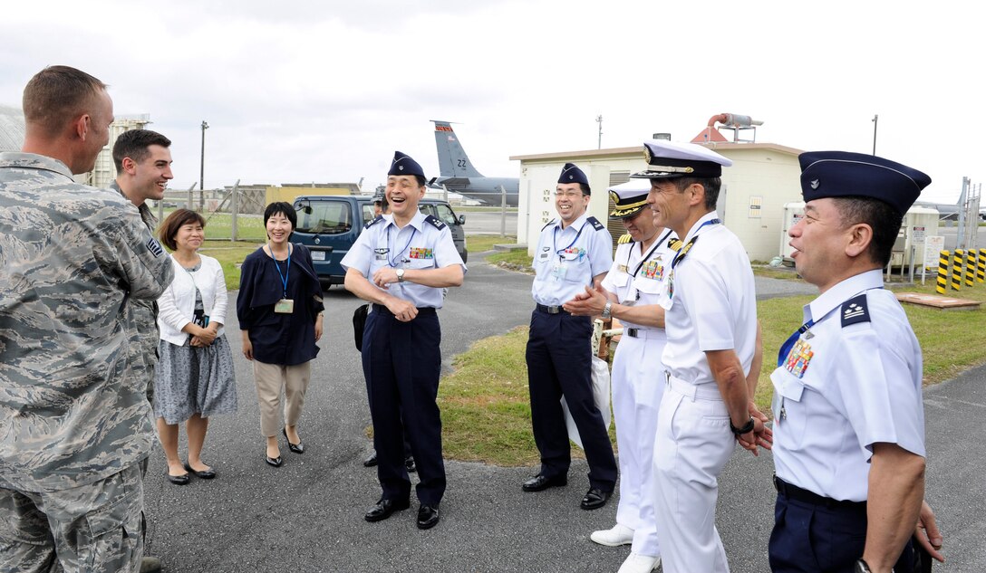 Japan Air Self-Defense Force members and U.S. Air Force Airmen from the 18th Logistics Readiness Squadron’s petroleum, oils and lubricants flight bond April 27, 2017, at Kadena Air Base, Japan. The 18th LRS POL flight frequently hosts bi-lateral tours of their facilities, fostering relationships between JASDF and Kadena AB members. (U.S. Air Force photo by Senior Airman Lynette M. Rolen)
