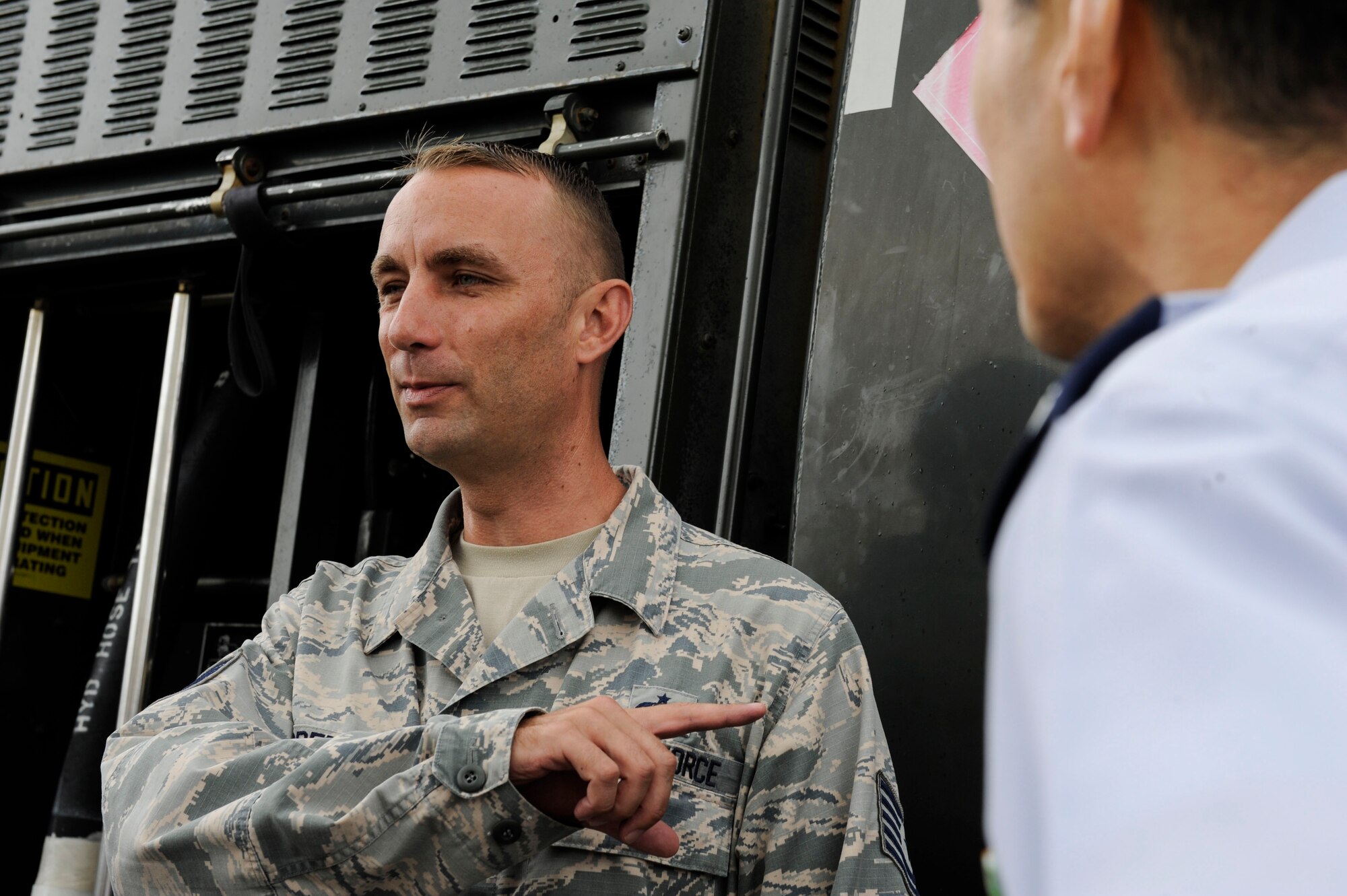 U.S. Air Force Tech. Sgt. Jeffrey Green, 18th Logistics Readiness Squadron fuels facilities NCO in charge, discusses an R-11 refueling truck to Japan Air Self-Defense Force Air Staff College members April 27, 2017, at Kadena Air Base, Japan. The R-11 is essential to providing fuel to Kadena’s aircraft and keeping them ready for any mission. (U.S. Air Force photo by Senior Airman Lynette M. Rolen)