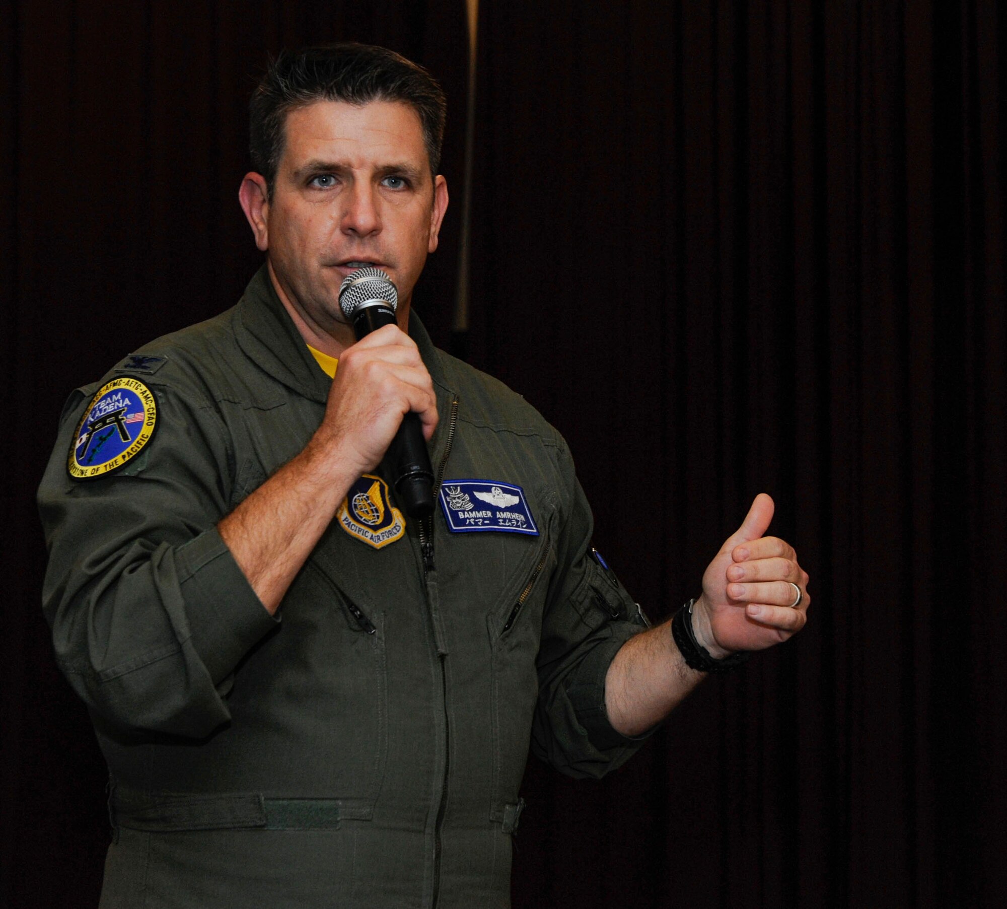 U.S. Air Force Col. Christopher Amrhein, 18th Wing vice commander, speaks to volunteers during the 18th Wing Annual Volunteer Recognition ceremony April 28, 2017, at Kadena Air Base, Japan. Amrhein spoke about the importance of volunteering and how it can make life-changing impacts on people. (U.S. Air Force photo by Senior Airman Lynette M. Rolen)