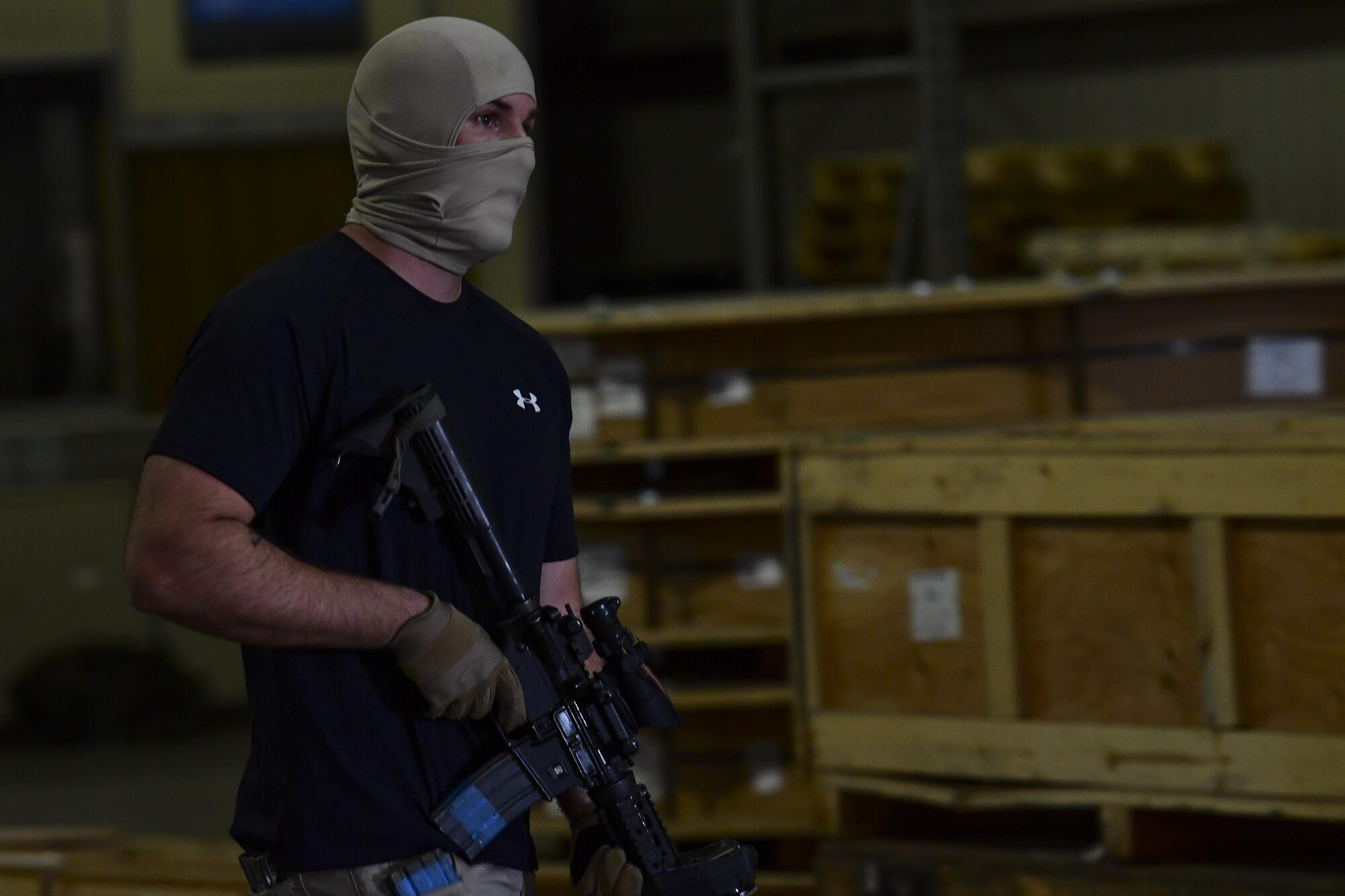 U.S. Air Force Staff Sgt. Cliff Coppenbarger, 51st Security Forces Squadron Defender, simulates being a hostile gunman during Exercise Beverly Sentinel 17-1 at Osan Air Base, Republic of Korea, May 4, 2017. Beverly Sentinel exercises test Team Osan’s ability to react to threats like active shooters, requiring agencies ranging from command post to security forces to swiftly respond to the present threat. (U.S. Air Force photo by Staff Sgt. Victor J. Caputo)