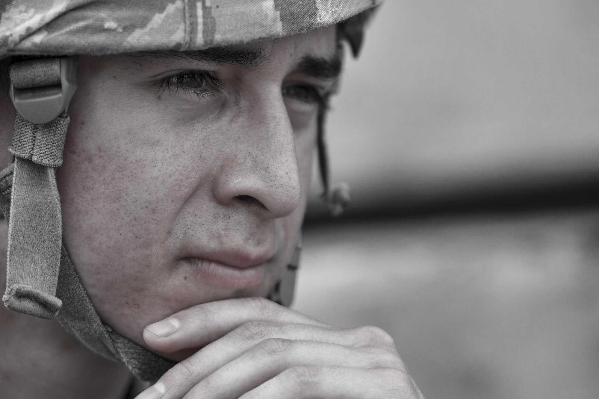 U.S. Air Force Airman 1st Class Andres Martinez, 51st Security Forces Squadron response force member, adjusts his chinstrap after sweeping a building for a simulated gunman during Exercise Beverly Sentinel 17-1 at Osan Air Base, Republic of Korea, May 4, 2017. Defenders were quick to respond to reports of gunfire during the exercise, executing building sweeps, Self-Aid and Buddy Care, and engaging in firefights with the two simulated gunmen. (U.S. Air Force photo by Staff Sgt. Victor J. Caputo)