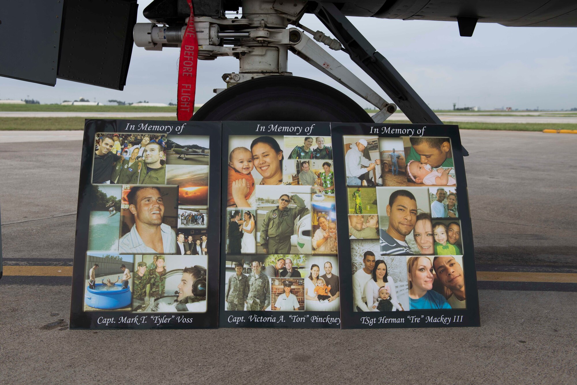 Photo collages of Capt. Mark Voss, Capt. Victoria Pinckney and Technical Sgt. Herman Mackey III, sit on display against the landing gear of a KC-135 Stratotanker during a memorial ceremony honoring the fallen crew members May 3, 2017, at Incirlik Air Base. Voss, Pinckney and Mackey were deployed to the 376th Air Expeditionary Wing’s 22nd Expeditionary Air Refueling Squadron in support of Operation Enduring Freedom when their KC-135 Stratotanker, callsign Shell 77, crashed in Northern Kyrgyzstan. (U.S. Air Force photo by Airman 1st Class Devin M. Rumbaugh)