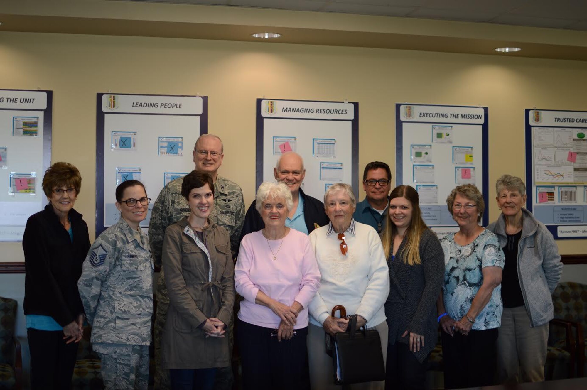 Members of the Travis Air Force Base Patient and Family Advisory Council gather after a meeting on April 26, 2017. 
Back row, from left to right: Mr. Mark Lane, 60th Medical Group Patient Relations Coordinator; Mr. Carl Downey; and Col. Howard Givens, Deputy Commander, 60th Medical Group.
Front row, from left to right: Ms. Pamela Riley; Ms. Patricia Tyler; Capt Grace Cortez, Clinical Nurse; Ms. Mary Johnsen; Ms. Bonnie Stemple; Ms. Julie Clark; MSgt Tina Romero; and Ms. Rosemary Ingram.
