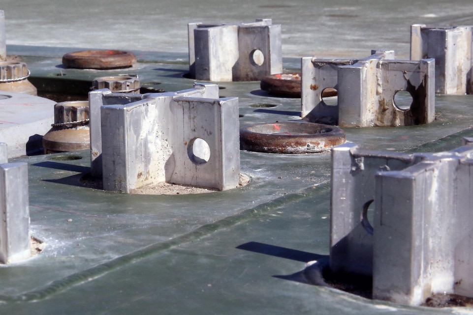 Anchoring points, key pieces of the recently built high power run up system, sit attached to the HPRU system on the flight line at Marine Corps Air Station Cherry Point, N.C., May 2, 2017. Heavy equipment operators and expeditionary airfield Marines assigned to Marine Wing Support Squadron 274, Marine Aircraft Group 14, 2nd Marine Aircraft Wing worked to construct the system together. The HPRU system is used to test aircraft engines before flight by securing them to the ground on anchoring points and running the engine at full power to ensure they can operate at full capacity and complete the mission safely. (U.S. Marine Corps photo by Cpl. Mackenzie Gibson/Released)