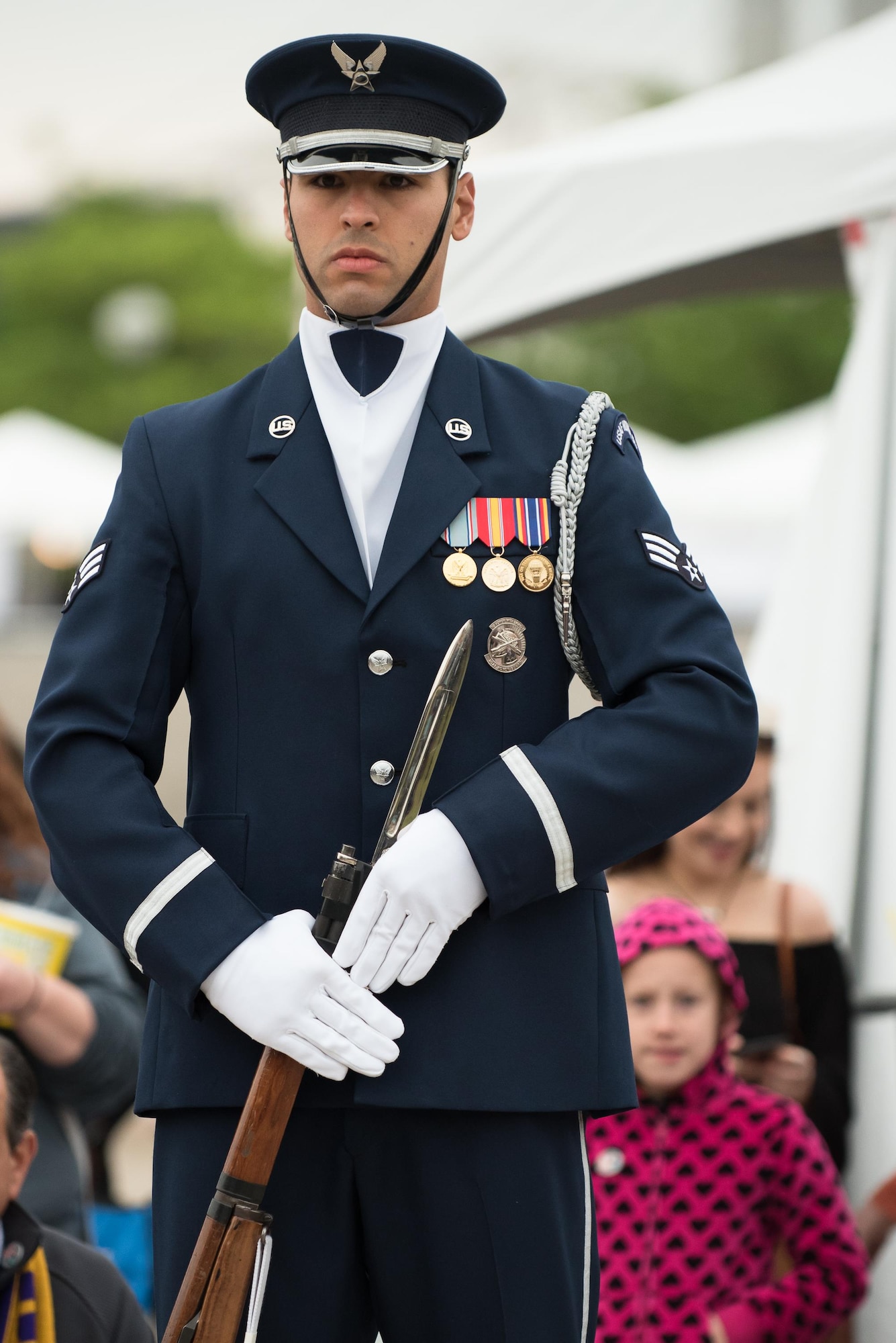 A member of the U.S. Air Force Honor Guard prepares to execute a precision rifle drill before an appreciative crowd at Waterfront Park in downtown Louisville, Ky., May 3, 2017, during the Kentucky Derby Festival. The Airman, from Joint Base Anacostia-Bolling in Washington, D.C., is part of a team that strives to represent the Air Force Core Values of integrity, service and excellence through precise drill movements, immaculate appearance and extreme attention to detail. (U.S. Air National Guard photo by Lt. Col. Dale Greer)