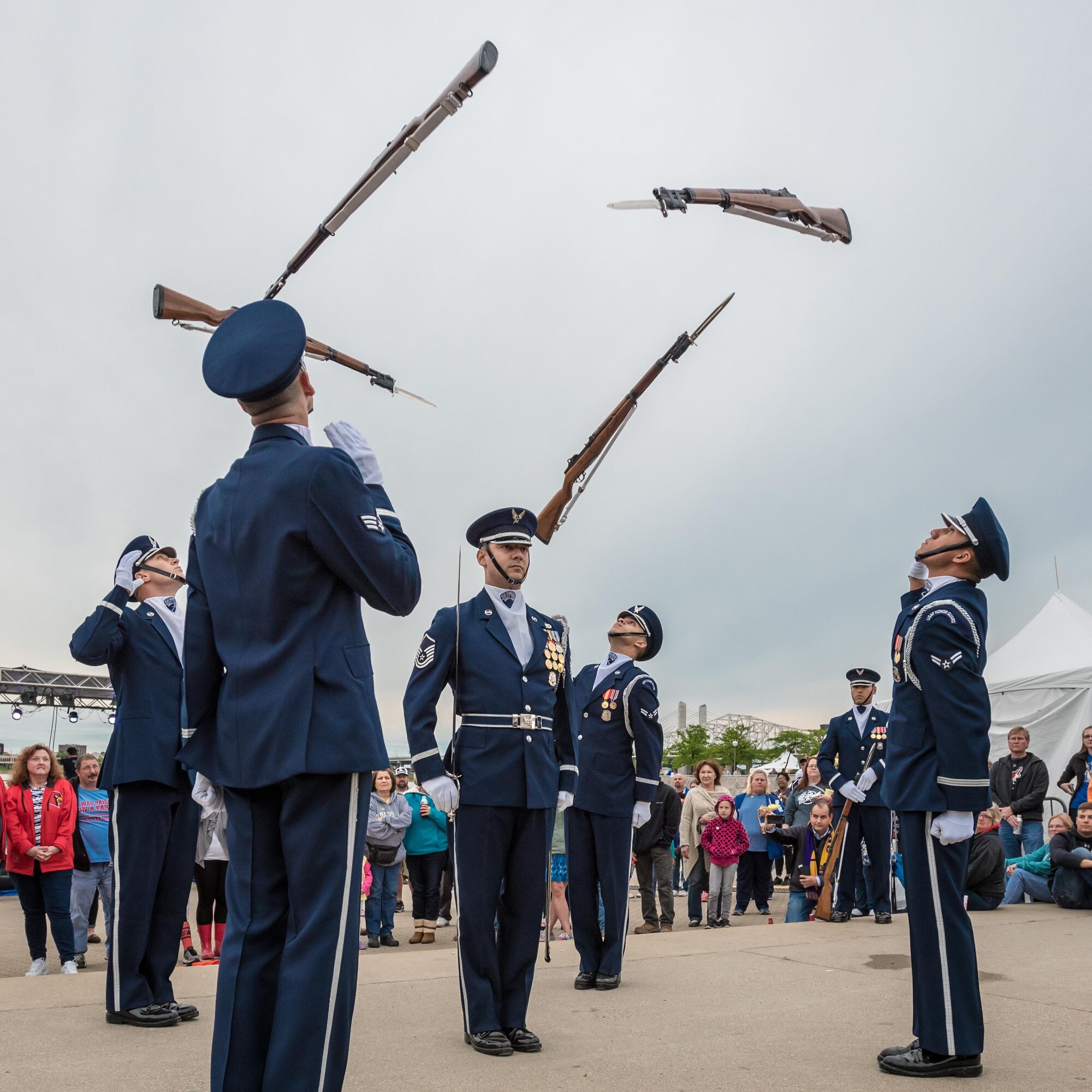 Members of the U.S. Air Force Honor Guard execute a precision rifle drill before an appreciative crowd at Waterfront Park in downtown Louisville, Ky., May 3, 2017, as part of the Kentucky Derby Festival. The Airmen, from Joint Base Anacostia-Bolling in Washington, D.C., strive to represent the Air Force Core Values of integrity, service and excellence through precise drill movements, immaculate appearance and extreme attention to detail. (U.S. Air National Guard photo by Lt. Col. Dale Greer)