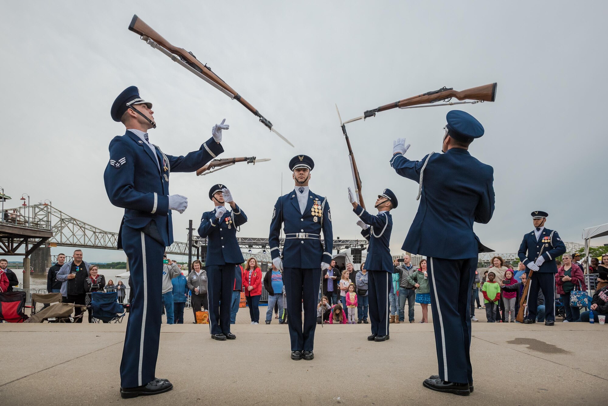 Members of the U.S. Air Force Honor Guard execute a precision rifle drill before an appreciative crowd at Waterfront Park in downtown Louisville, Ky., May 3, 2017, as part of the Kentucky Derby Festival. The Airmen, from Joint Base Anacostia-Bolling in Washington, D.C., strive to represent the Air Force Core Values of integrity, service and excellence through precise drill movements, immaculate appearance and extreme attention to detail. (U.S. Air National Guard photo by Lt. Col. Dale Greer)