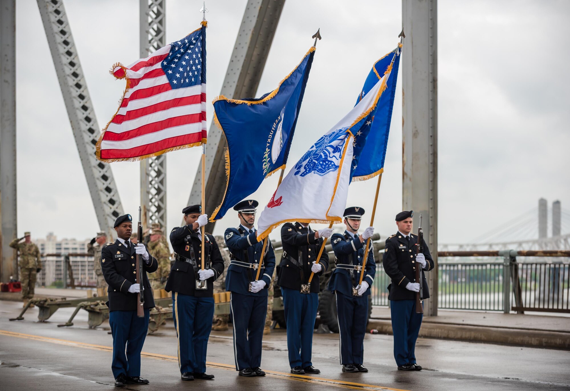 A joint color guard comprised of members from the Kentucky Army and Air National Guard present the colors to kick off the Thunder Over Louisville air show at the downtown waterfront in Louisville, Ky., April 22, 2017. The event, which features more than a dozen military aircraft, has grown to become the largest annual single-day air show in America. (U.S. Air National Guard photo by Lt. Col. Dale Greer)