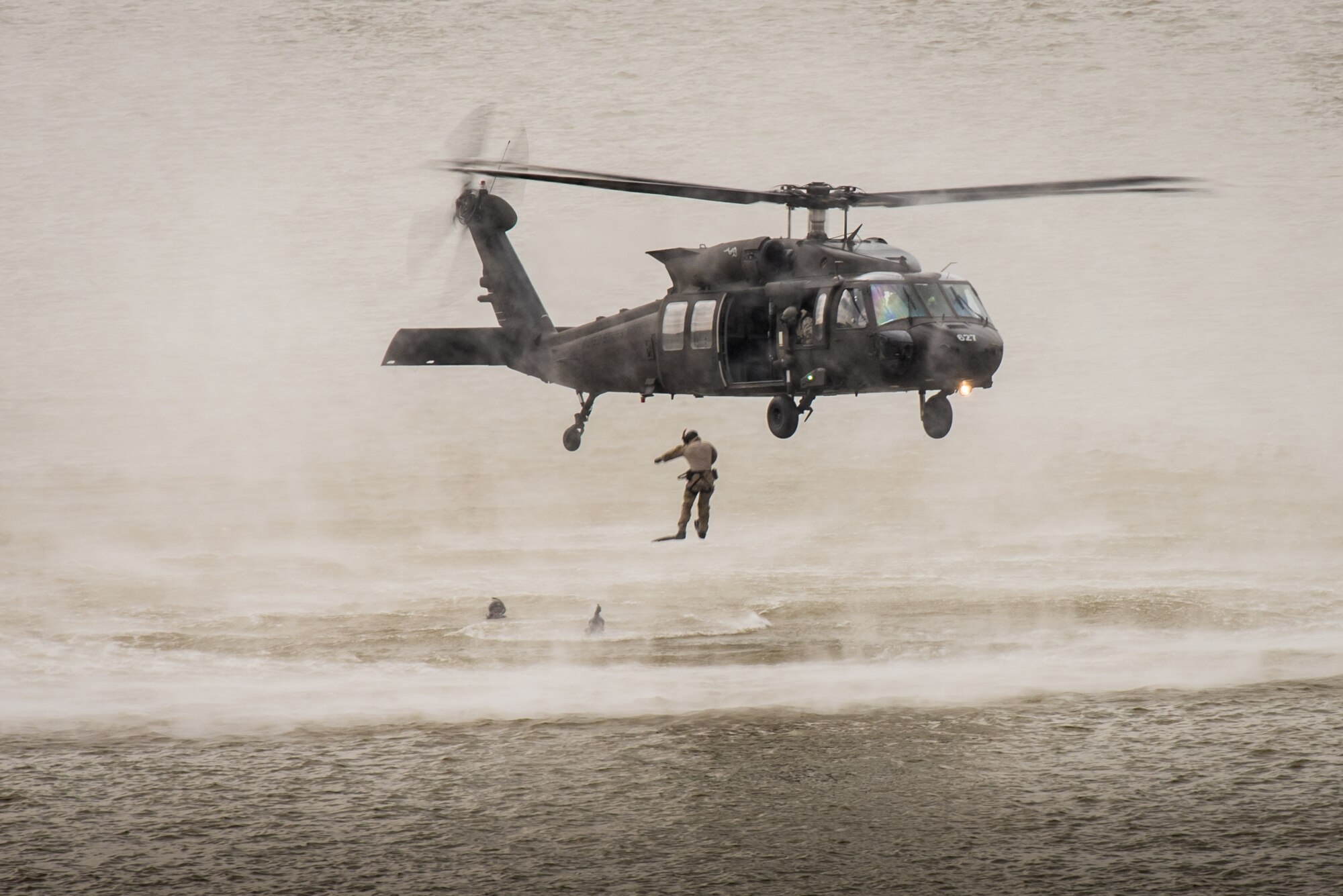 Airmen from the Kentucky Air National Guard’s 123rd Special Tactics Squadron jump in the Ohio River from a Kentucky Army National Guard UH-60 Blackhawk helicopter during the Thunder Over Louisville air show in Louisville, Ky., April 22, 2017. The demonstration is designed to show how the Airmen enter a body of water to conduct a rescue operation and recover downed personnel. (U.S. Air National Guard photo by Lt. Col. Dale Greer)