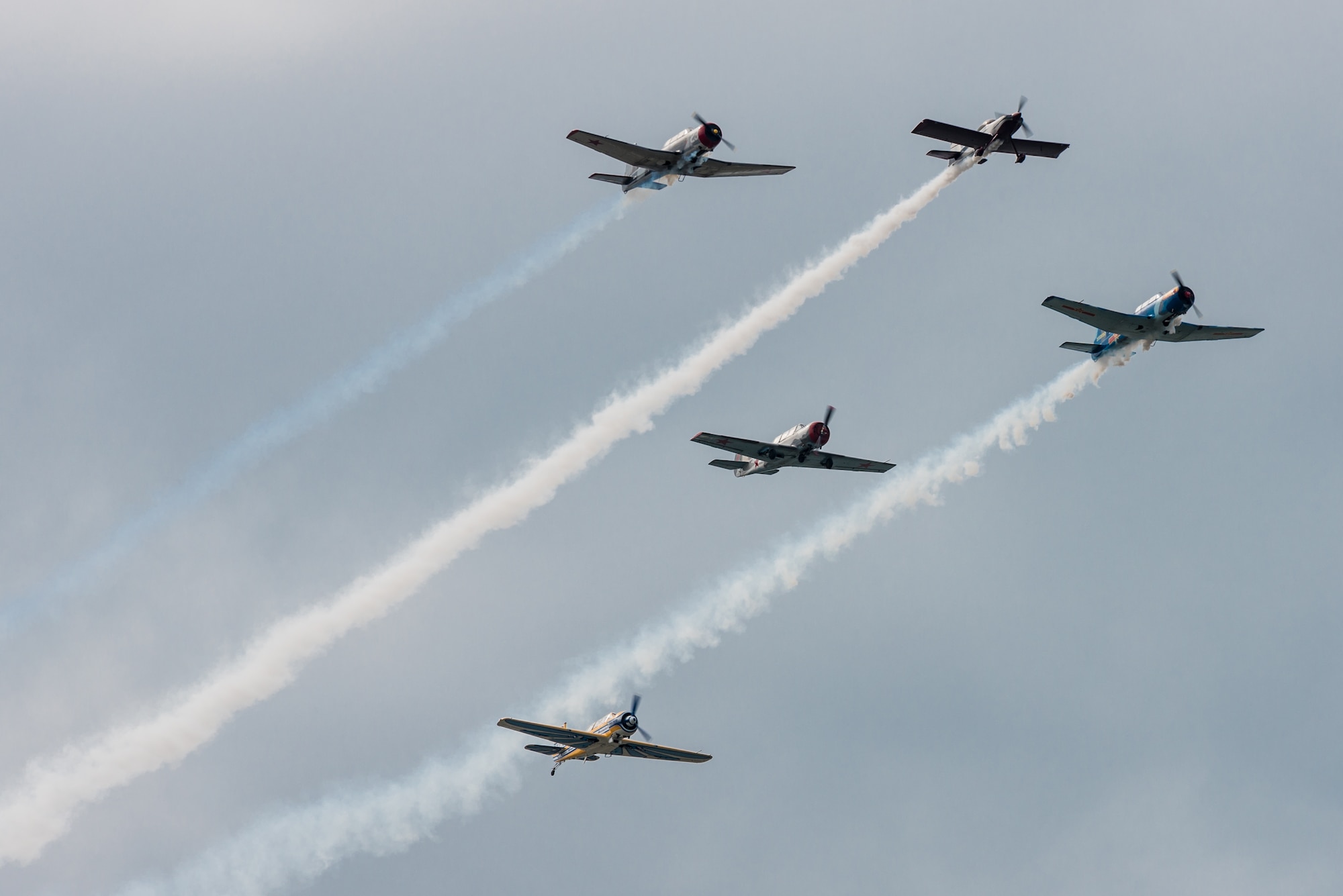 A group of World War II-era warbirds flies an aerial demonstration over the Ohio River April 22, 2017, during the Thunder Over Louisville air show in Louisville, Ky. The annual event has grown to become the largest single-day air show in the nation. (U.S. Air National Guard photo by Lt. Col. Dale Greer)